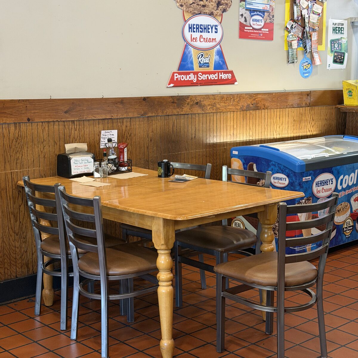 The dining room at The Coney Island in Pottsville, PA, with tables and chairs.