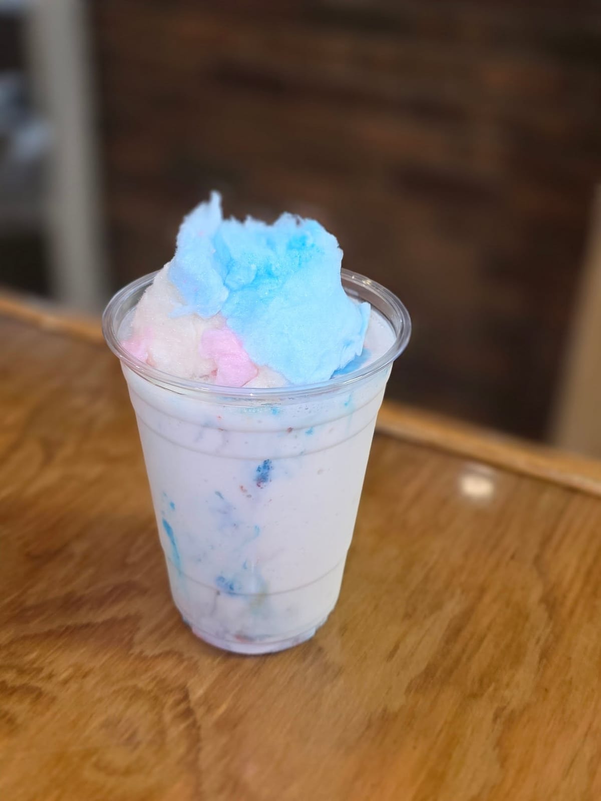 A milkshake crowned with a cloud of blue and pink cotton candy at The Coney Island in Pottsville, PA.