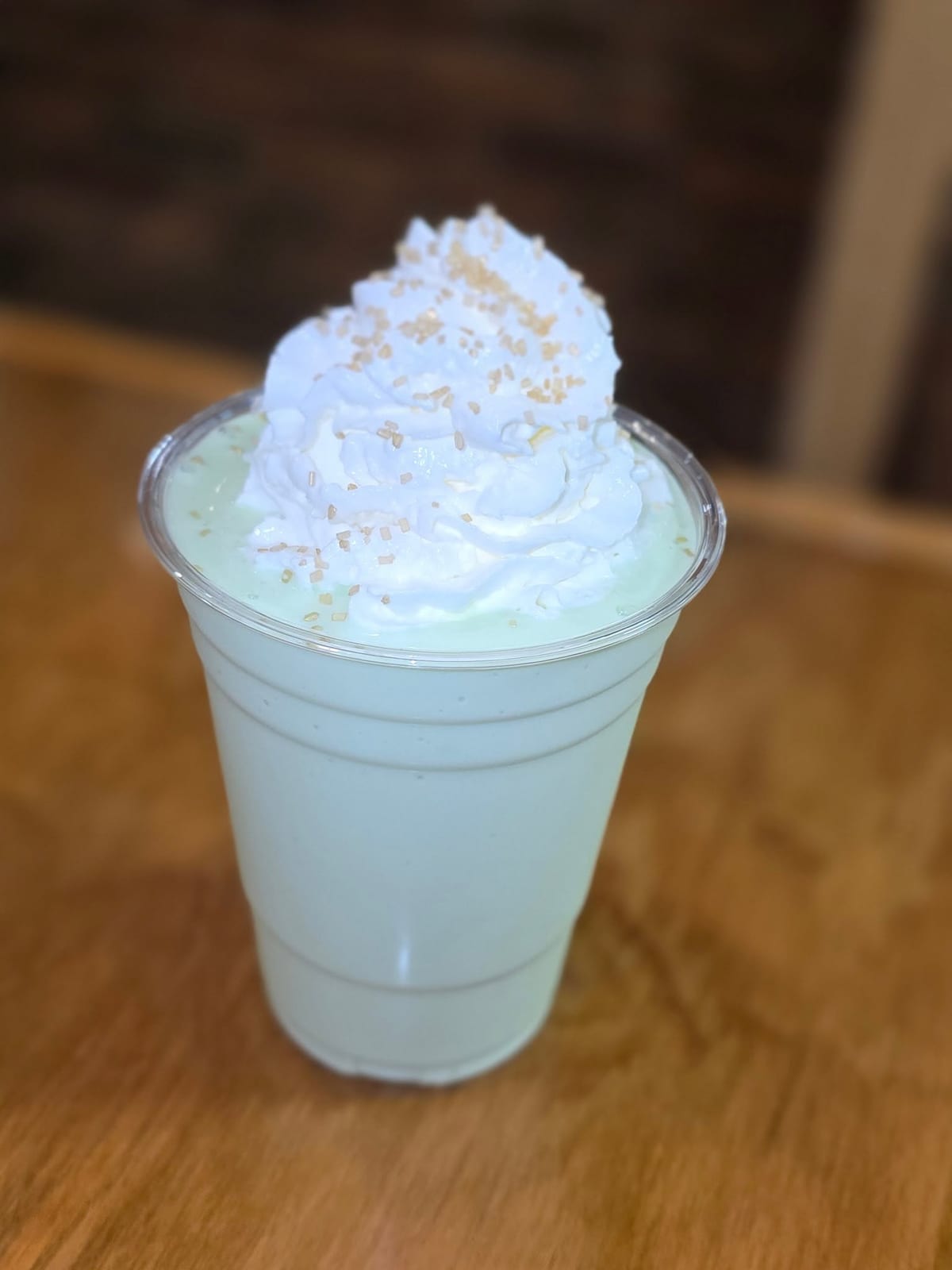 A Gourmet Milkshake topped with whipped cream and golden sugar at The Coney Island in Pottsville, PA.