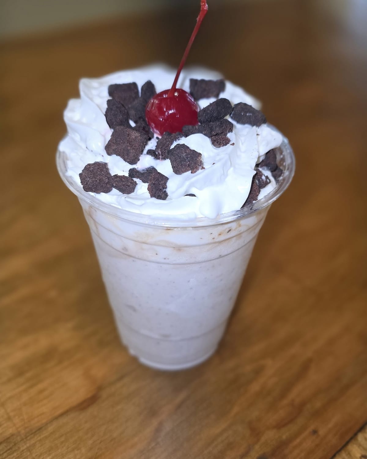 A Snow Storm — a shake piled with whipped cream, brownie pieces, and a cherry at The Coney Island in Pottsville, PA.