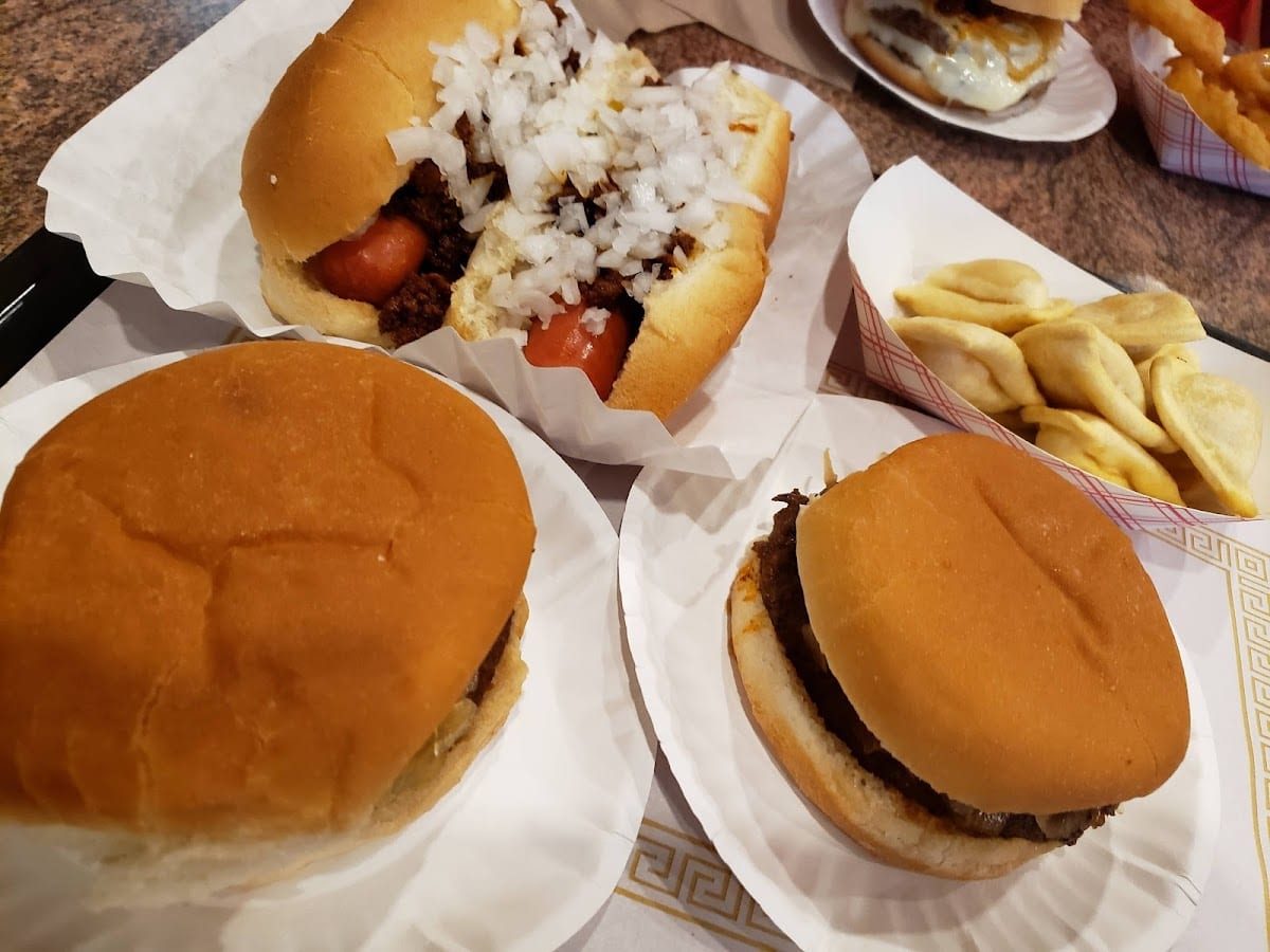A Coney Dog with chili and raw onions at The Coney Island in Pottsville, PA — the 1917 classic, served alongside burgers and pierogies.